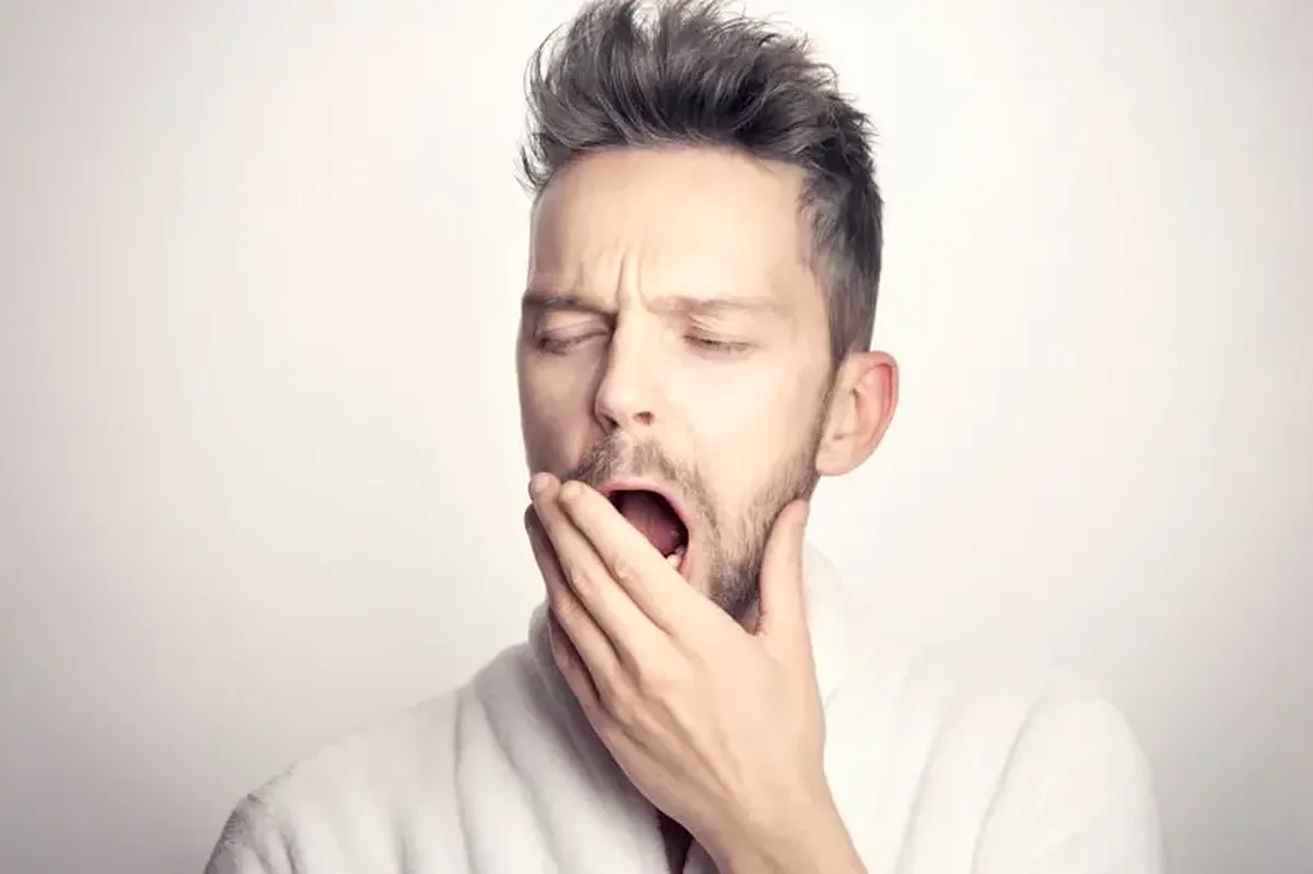man in a white long-sleeved shirt