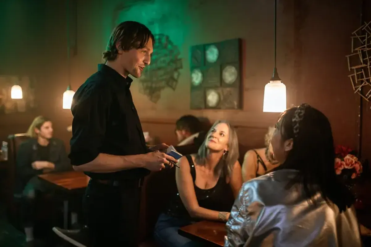 Why do restaurants offer bread and alcohol before a meal? An expert explains.