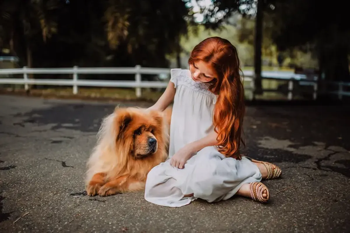 Why a family dog can add nearly an hour of activity to a girl's day 3 Having a dog at home guarantees a girl's active lifestyle.
