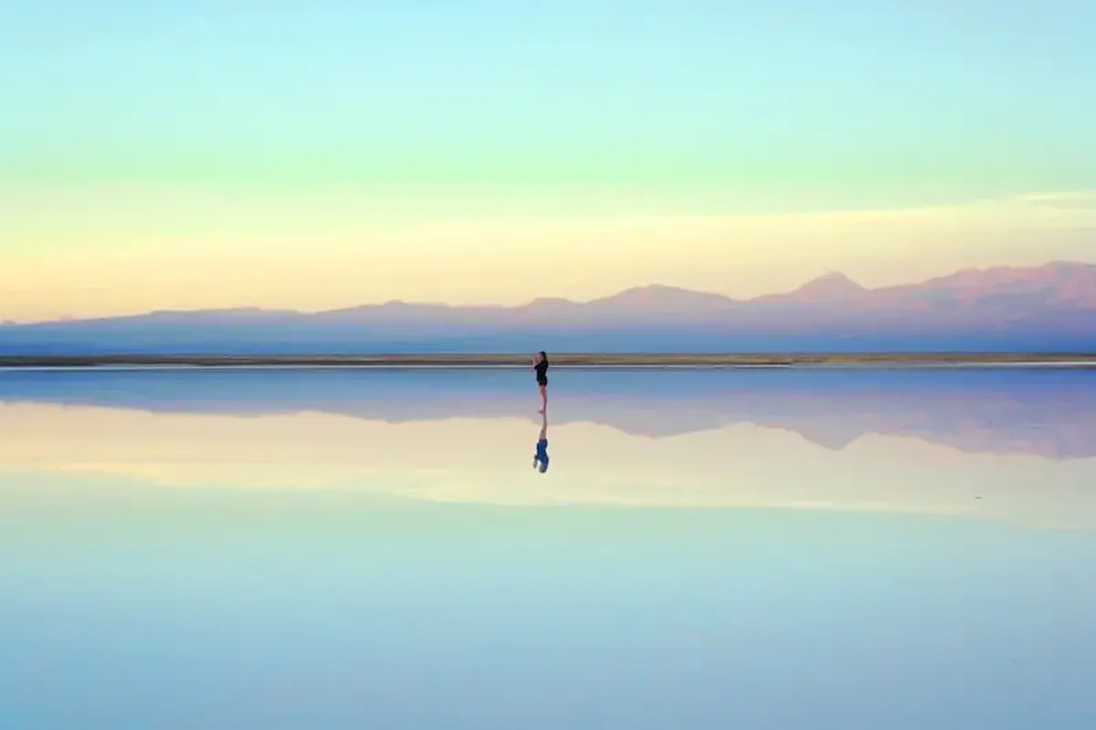 When Three Weeks Felt Like a Century 3 A person standing near a body of water during the daytime.