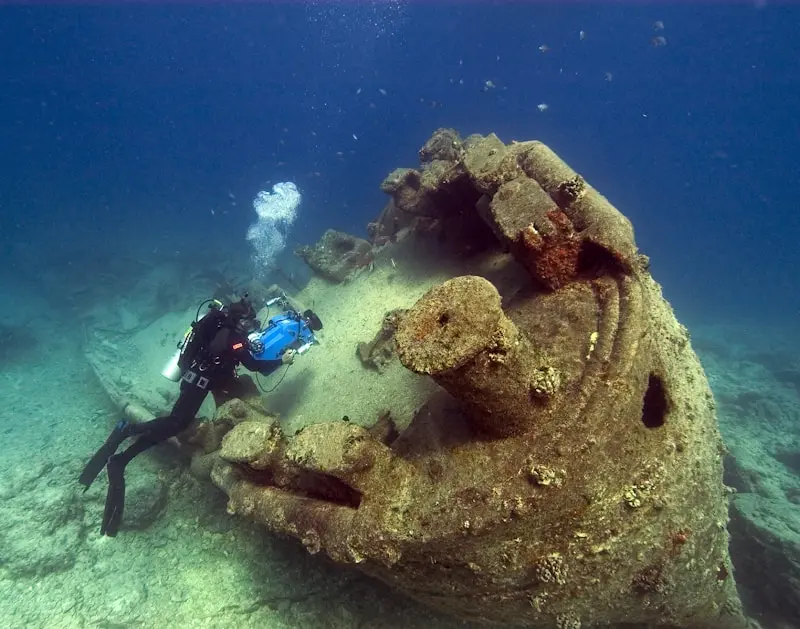 How Honey Helped Divers Raise the Lusitania 3 person scuba diving underwater
