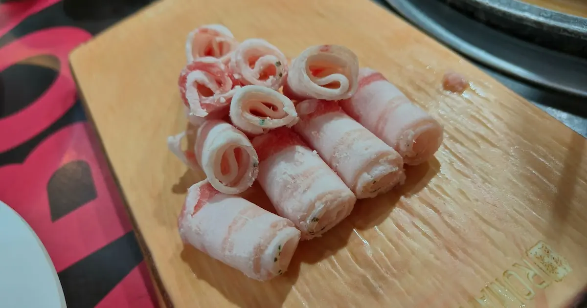 Crispy Cheese-Stuffed Pork Roll-Ups 3 a bunch of food on a cutting board