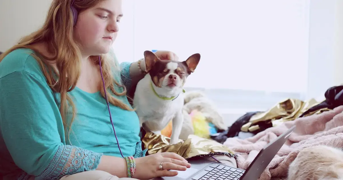 Undiagnosed Autism in Adults: 7 Often-Missed Signs 4 a girl with a puppy