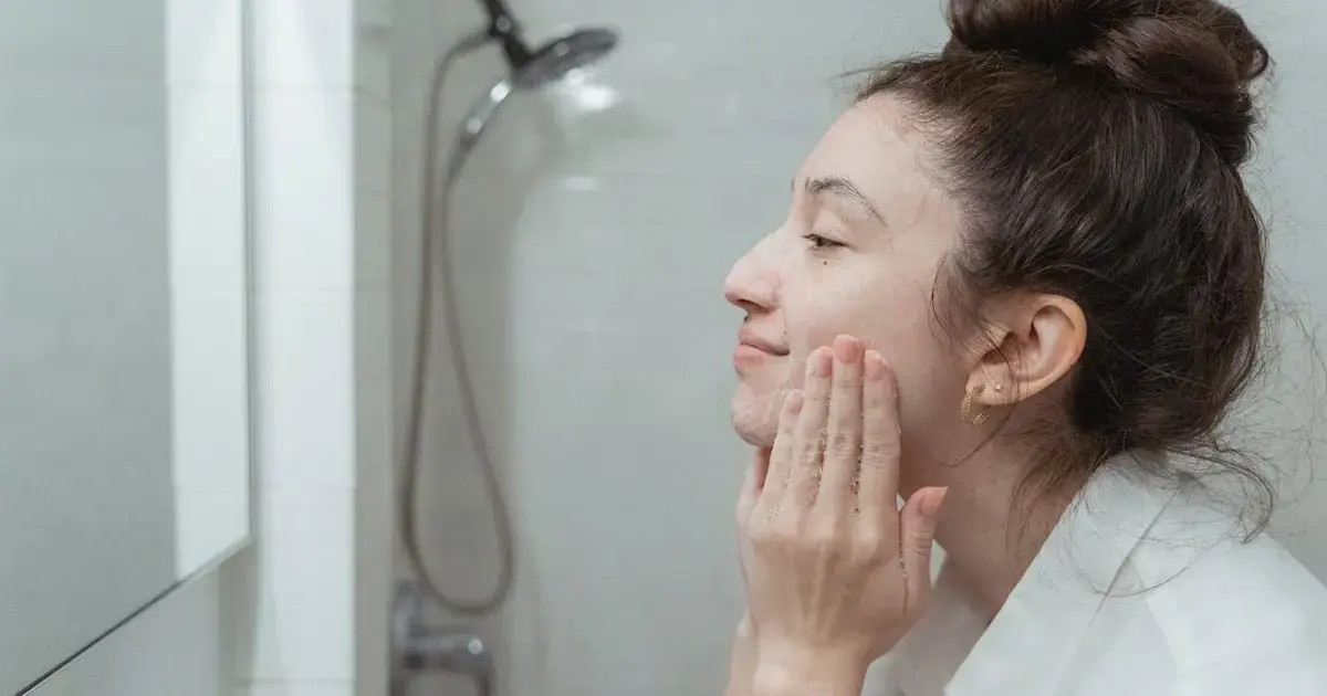 woman washing her face