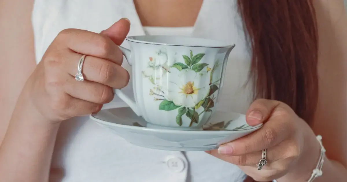 From Morning Black Tea to Bedtime Chamomile: The Best Tea to Drink All Day 6 a woman with a cup of tea