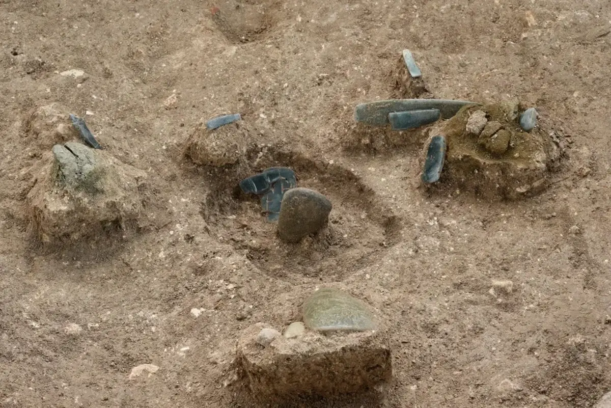 A 3,000-Year-Old Maya Map of the Cosmos Sprawls Across an Area the Size of a City 4 Jade artifacts (1)