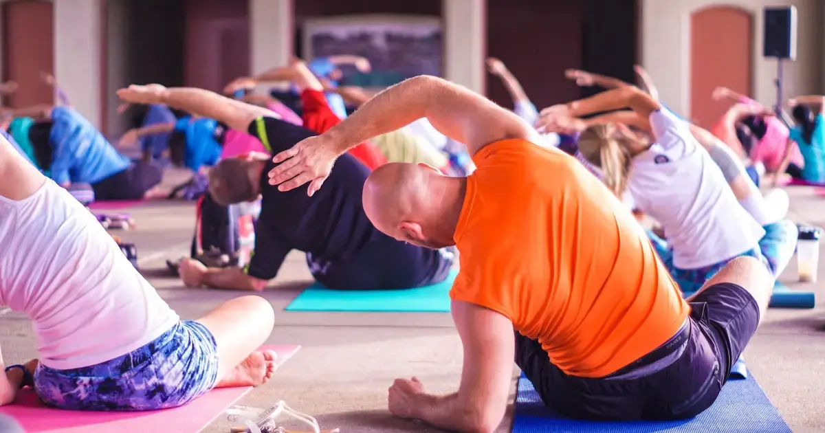 My Back Hurts — Here’s Why and What Actually Helps 8 people exercising