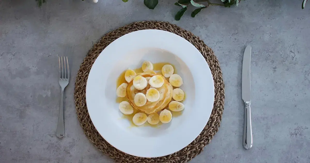 Don't Wait for January — 10 Science-Backed Ways to Boost Your Health Now 5 Bananas on a plate.