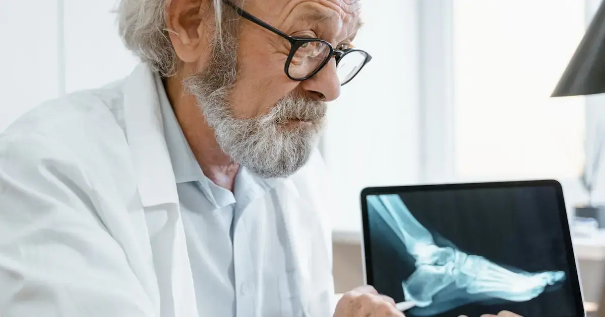 A doctor showing an X-ray image.