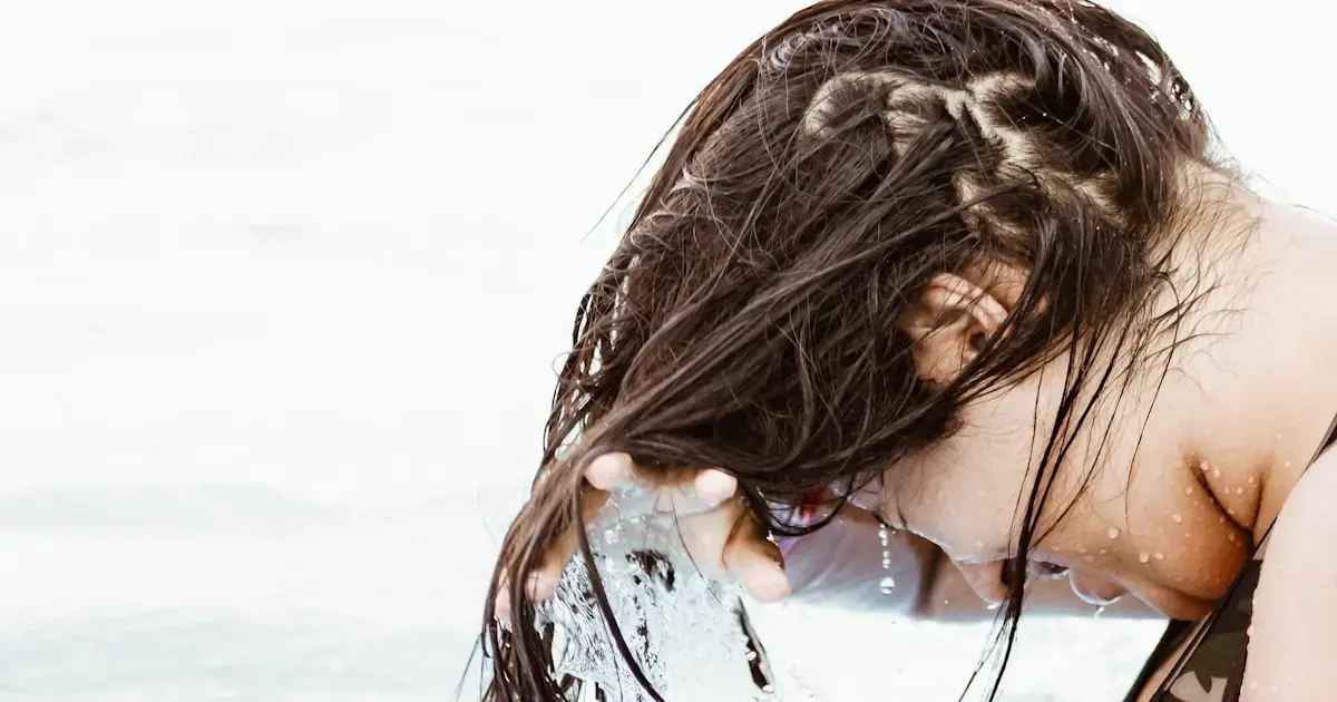 a woman washing her hair
