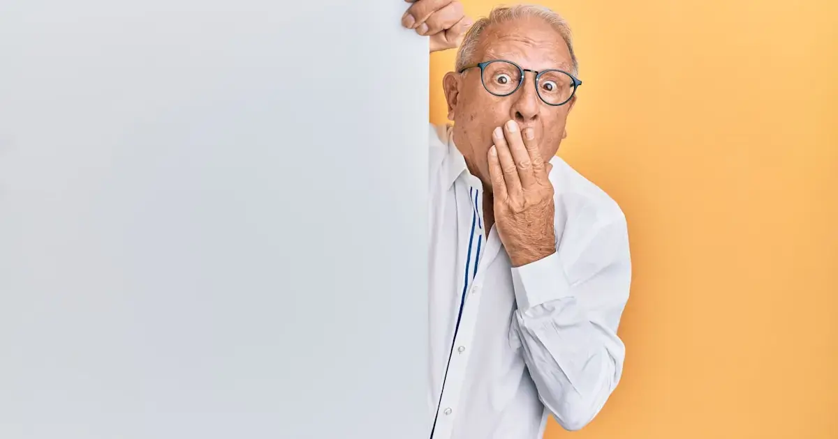 Why Fear of Loss Paralyzes Decision-Making 4 A frightened man peeks around a wall.