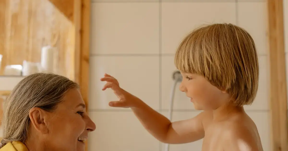 grandmother and her grandson in the bath