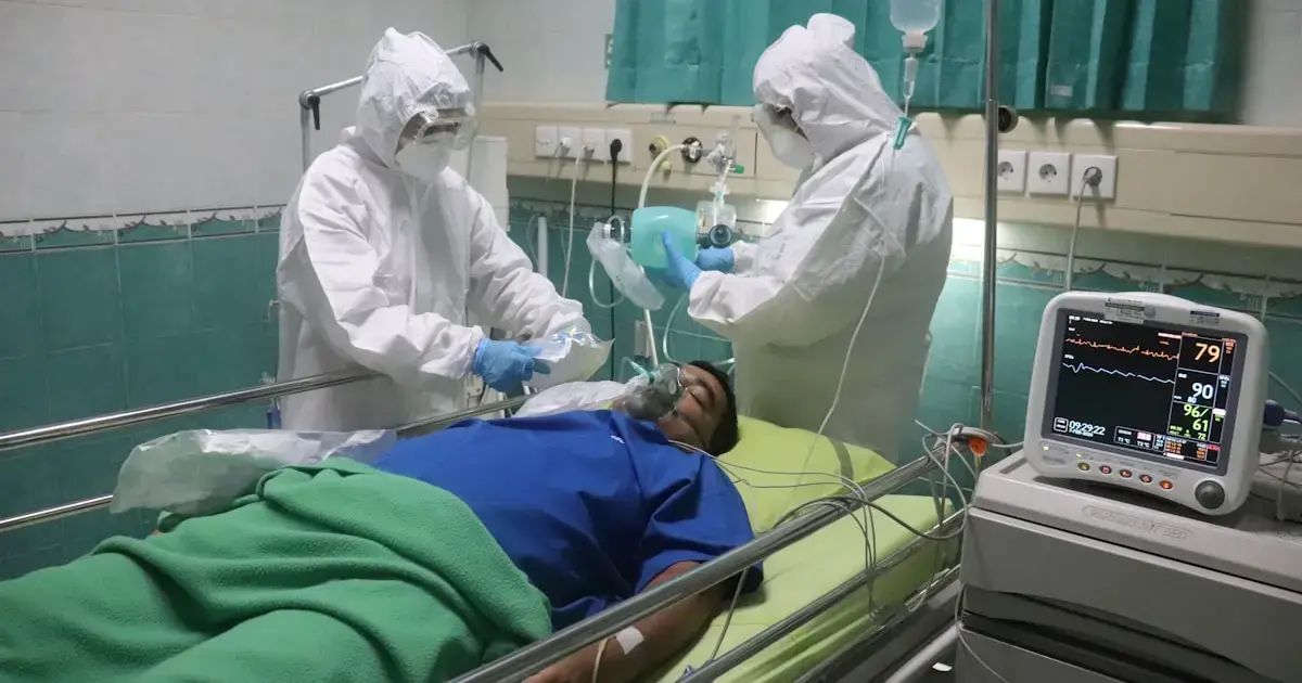 What to know about the deadly Nipah outbreak spreading in India 4 a man in a hospital