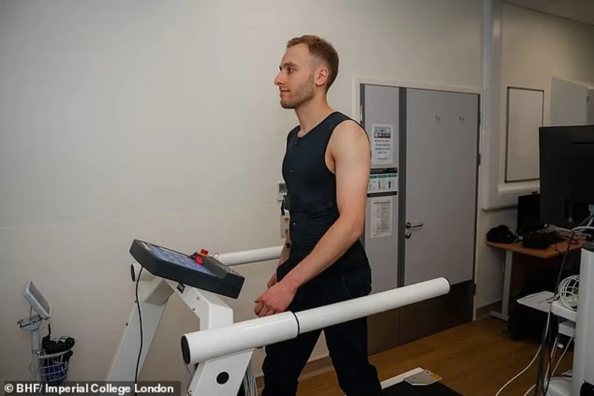 A man on a treadmill wearing a smart shirt