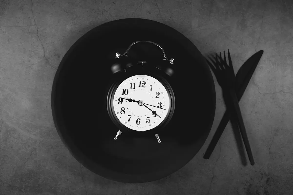 Calorie Counting Is Outdated — What Actually Controls Your Weight 4 a clock on a plate