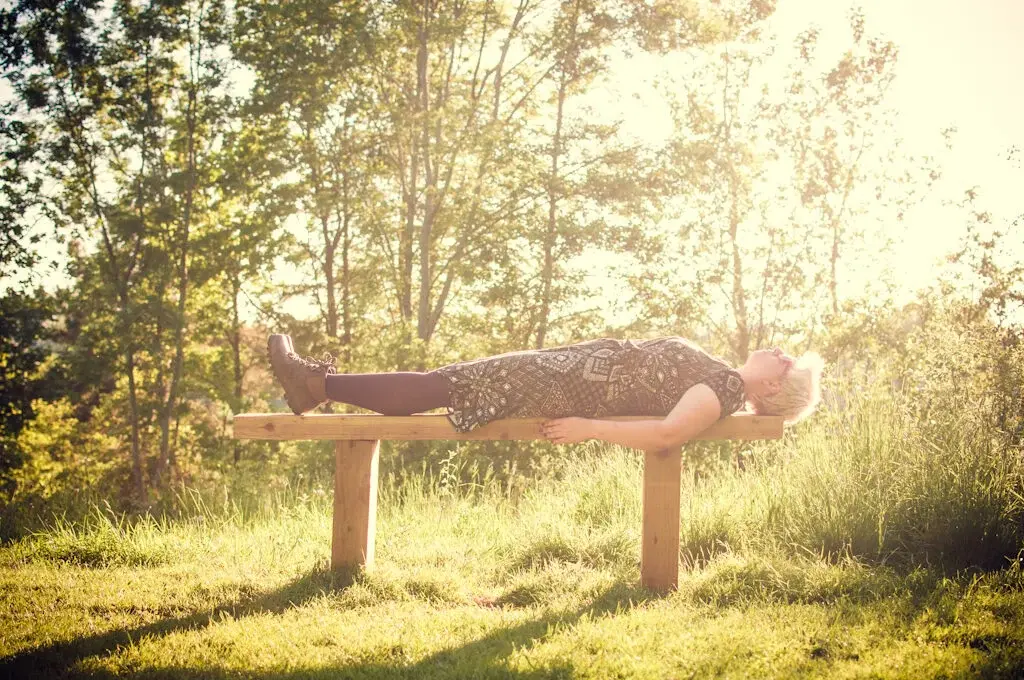 A woman lying in the sun.