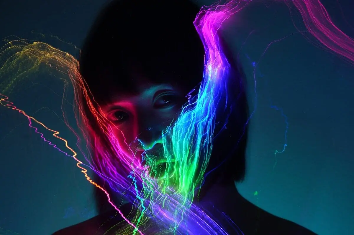 woman in colorful lights