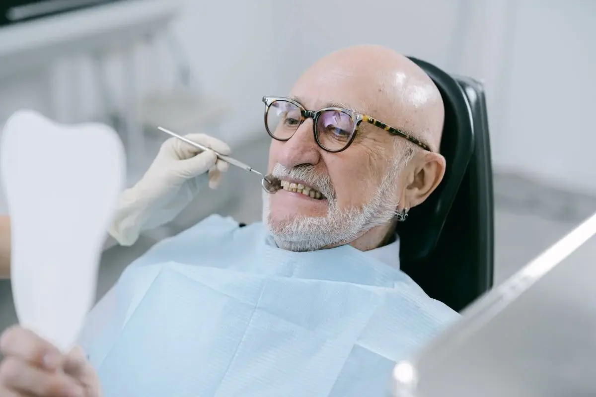 Older man at the dentist
