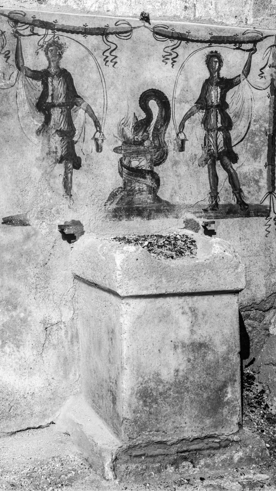 How Pompeii Smelled Before the Eruption 5 Pompeian street altar painted with images of gods and traces of ash