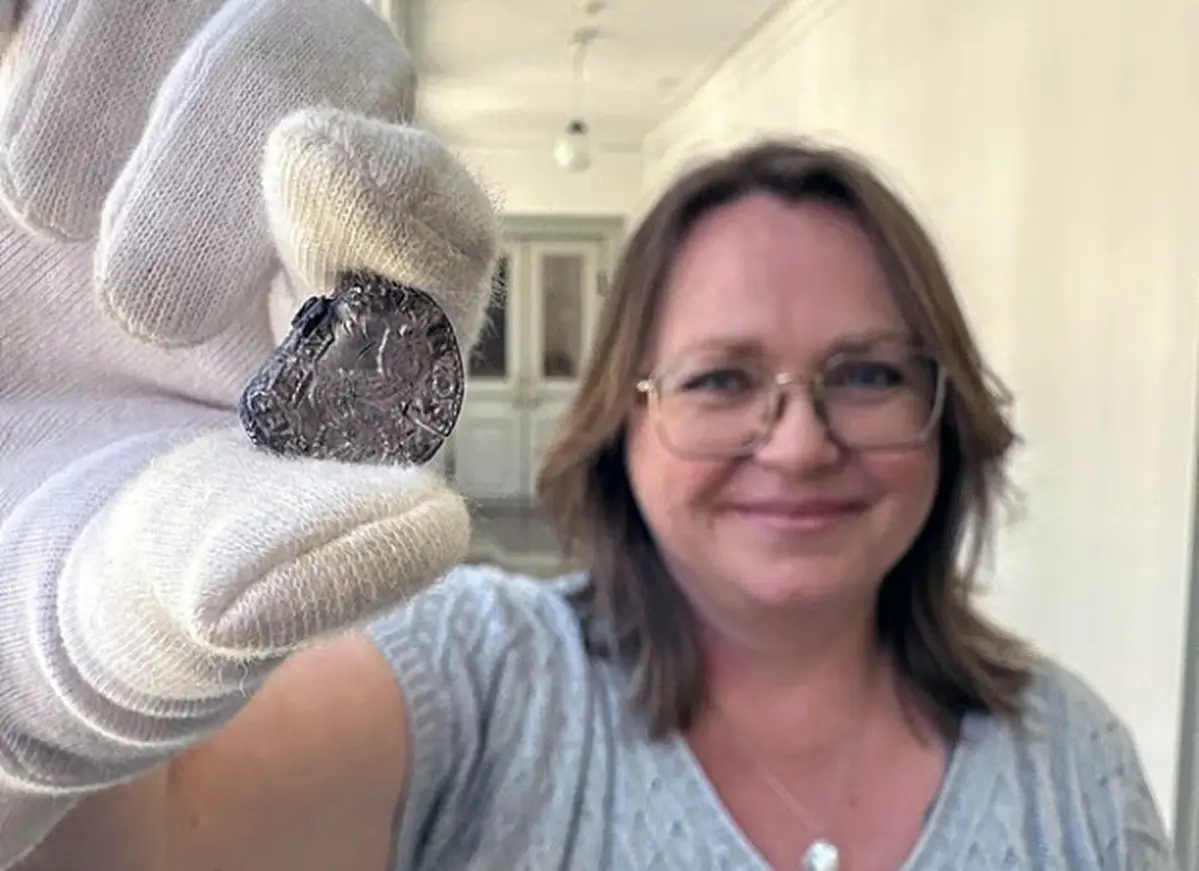 Two rare 'Lamb of God' pennies with Alpha and Omega symbols turn up in Denmark 4 Researcher with a 'Lamb of God' coin