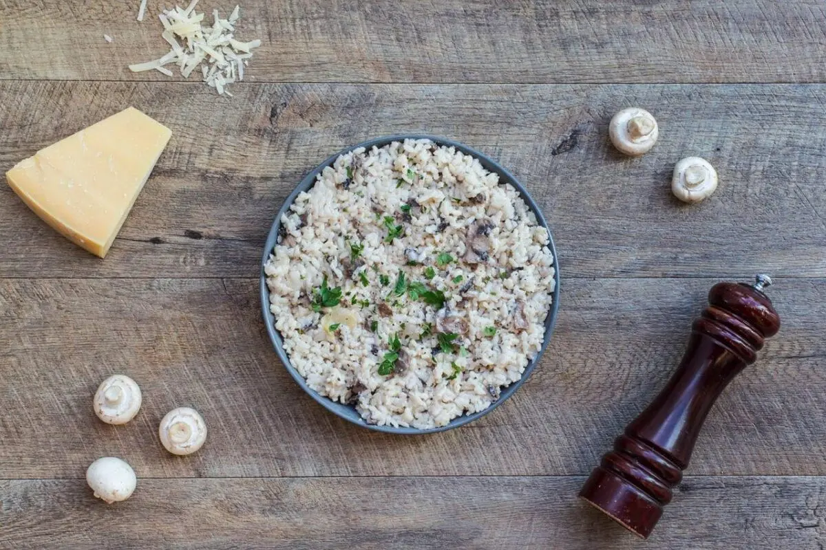 mushrooms, cheese, risotto on table