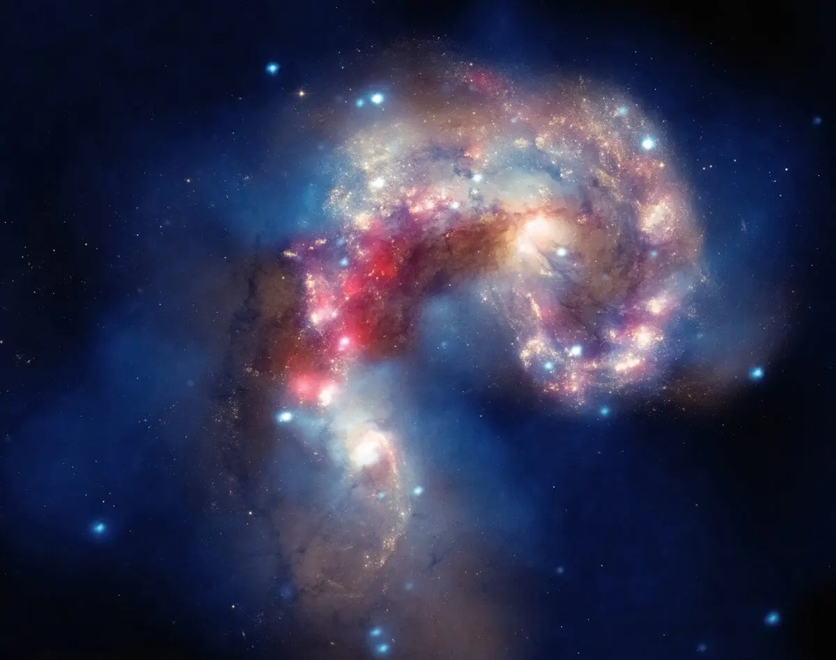 Two Monster Black Holes Are Merging—and They've Swept Out a 7,000‑Light‑Year Hole 4 galaxies in space